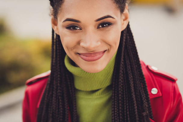 Cropped photo of young attractive cheerful african woman happy positive smile wear green turtleneck outdoors - Foto, imagen