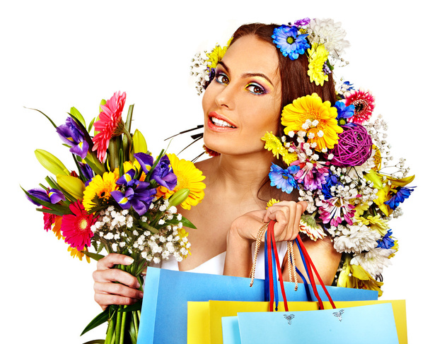 žena s nákupní taškou drží květ. - Fotografie, Obrázek