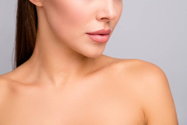 Closeup cropped profile photo of attractive lady nude shoulders plump perfect shape lips after injecting enhancement fillers ideal contour cheek line isolated grey color background - 写真・画像