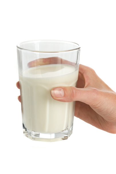 Glass of milk in hand - Фото, зображення