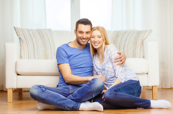 Smiling happy couple at home - Foto, imagen