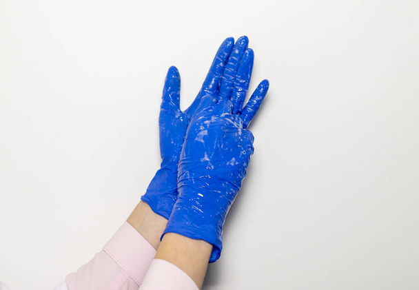 Doctor hands in gloves with stethoscope, medical exam concept over white background. rules of washing. - Fotoğraf, Görsel