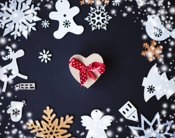 Christmas and New Year decorative ornaments and gifts on dark background.Top view - 写真・画像