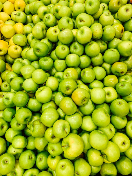 lots of ripe fruit sweet apples for cooking as a background - Photo, Image