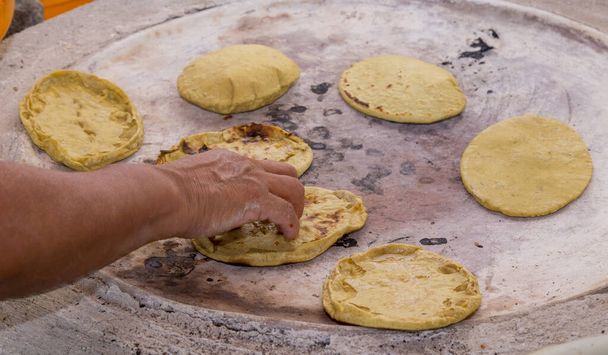 https://cdn.create.vista.com/api/media/small/428699026/stock-photo-handmade-tortilla-clay-comal