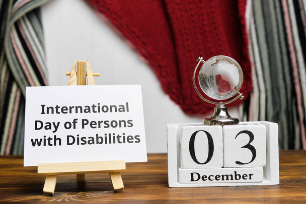 Día Internacional de las Personas con Discapacidad de invierno mes calendario diciembre. - Foto, Imagen