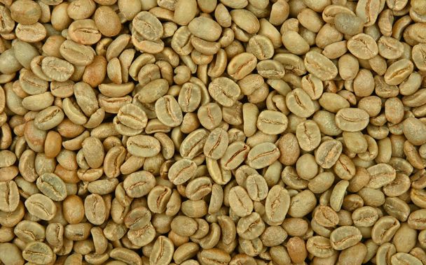 Close up textura de fundo de grãos de café árabe verde cru não torrado, vista superior elevada, diretamente acima - Foto, Imagem