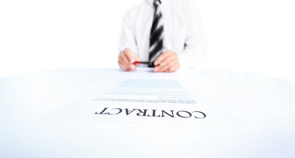 Business worker signing the contract to conclude a deal - 写真・画像
