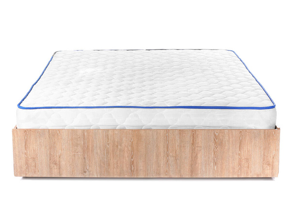 Bed with modern orthopedic mattress on white background - Photo, Image