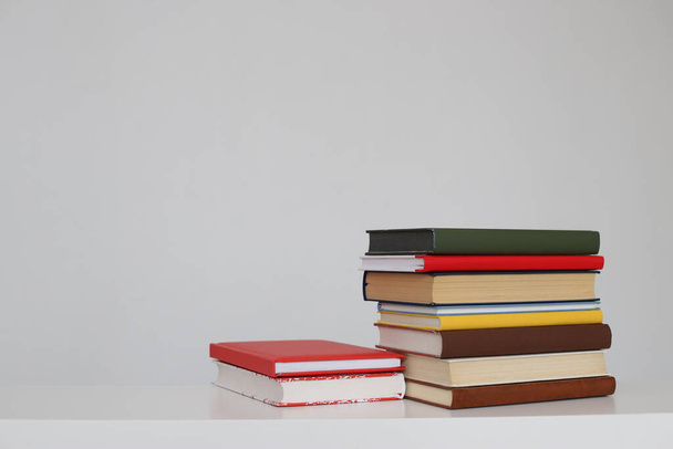 Stack of books on white background - Фото, зображення