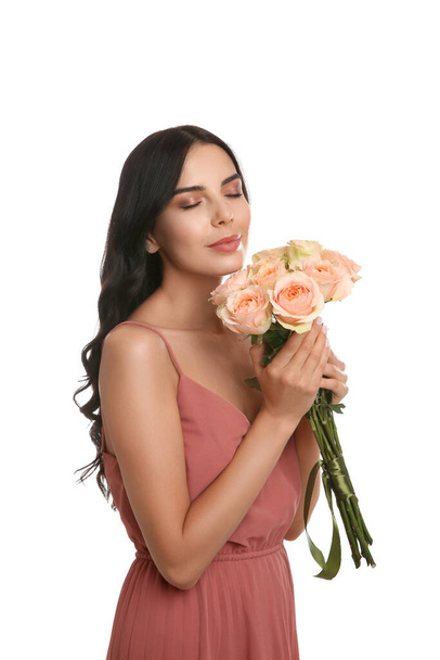 Young woman with beautiful bouquet on white background - Zdjęcie, obraz