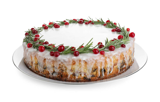 Traditional Christmas cake decorated with rosemary and cranberries isolated on white - Foto, Bild