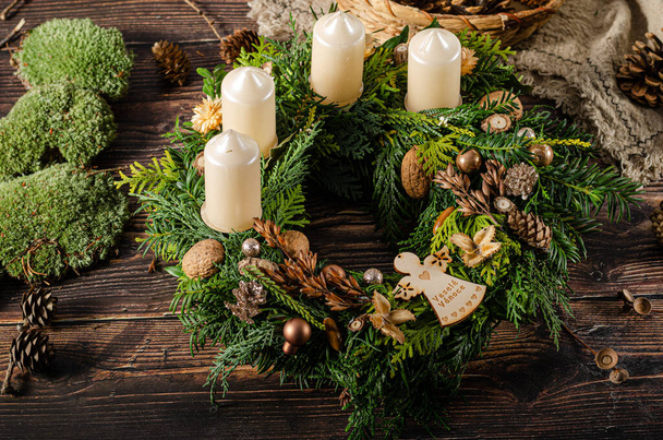 Homemade christmas wreath for upcoming christmas celebration - 写真・画像