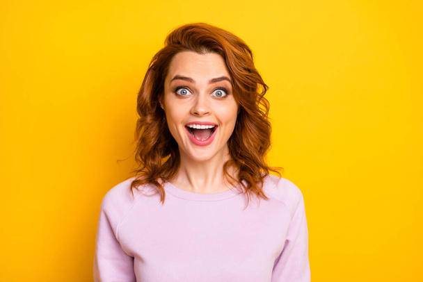 Closeup photo of beautiful pretty ginger lady open mouth listen cool good news enjoy unexpected surprise wear pink pullover shirt isolated yellow color background - Foto, afbeelding
