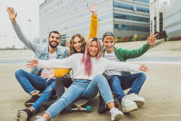 Happy young people meeting outdoors - Group of cheerful teenagers having fun, concepts about teenage, lifestyle and generation z - Fotoğraf, Görsel
