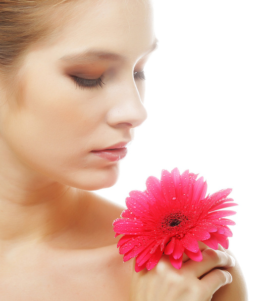 Beautiful young woman with gerber flower - Fotoğraf, Görsel