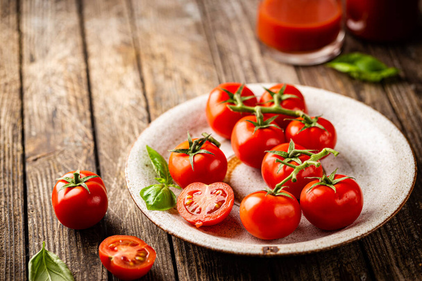 Fresh tomatoes in a plate - Fotó, kép