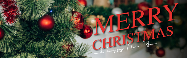 decorated pine branches with red balls near merry christmas and happy new year lettering, banner - Photo, image