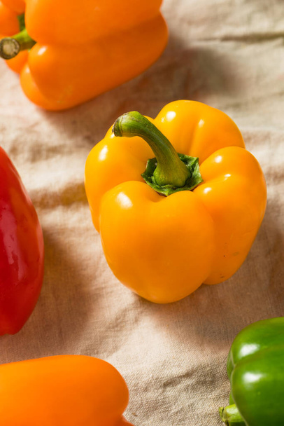 Raw Organic Colorful Bell Peppers in a Bunch - Foto, imagen