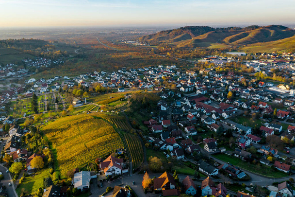 Colorful landscape aerial view of little village Kappelrodeck in Black Forest mountains. Beautiful medieval castle Burg Rodeck. Germany. - Photo, Image