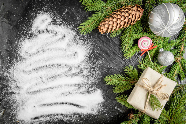 Christmas background.Christmas tree with pine cone. - Photo, Image