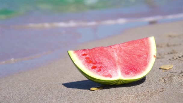 Slice of watermelon on the beach - Footage, Video