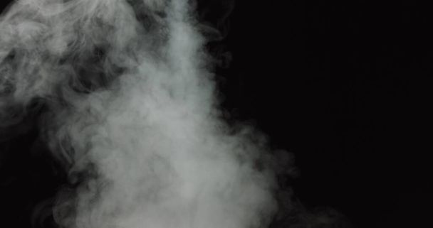Low density smoke puff spreading concentrically outwards Gunshot smoke Shockwave smoke. Separated on pure black background, contains alpha channel. - Photo, Image
