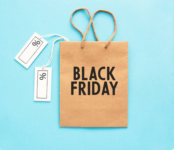 white ticket label Sale tag with shopping paperbag, black Friday or cyber monday shopper - online shopping concept - Fotoğraf, Görsel