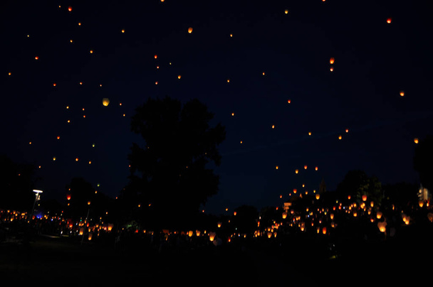 flying paper lanterns at night beautiful fire a lot - Photo, Image