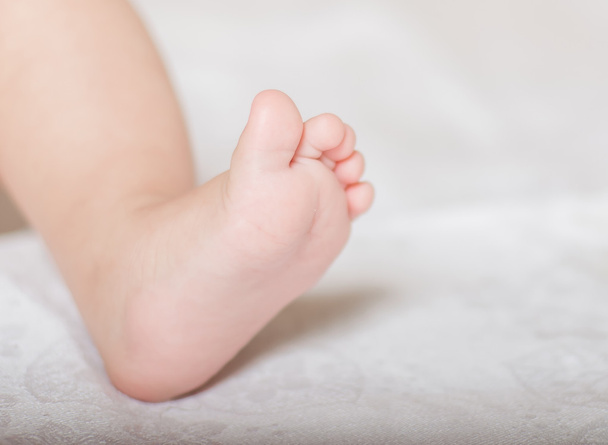 Little baby close-up foot - Foto, imagen