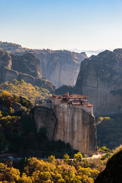 Roussanou monastery, an unesco world heritage site,  located on a unique rock formation  above the village of Kalambaka during fall season. - 写真・画像