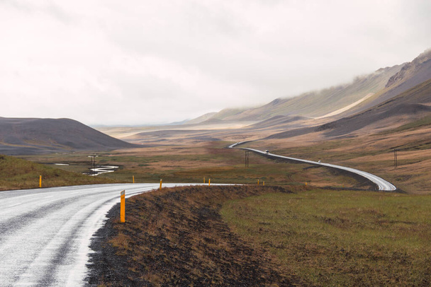 Scenic landscape view of Icelandic road and beautiful areal view of the nature in summer - Photo, Image
