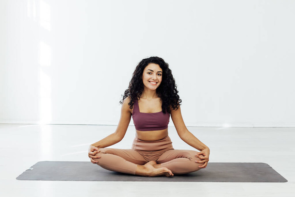 Beautiful female brunette sports yoga fitness asana body flexibility - Photo, Image