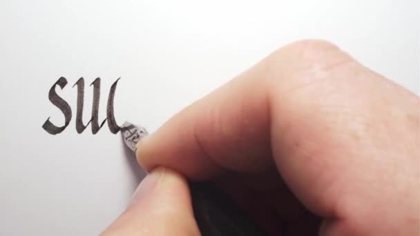 Menestystarina. Käsin kirjoittaminen kynällä. Kalligrafian lähikuva. - Materiaali, video