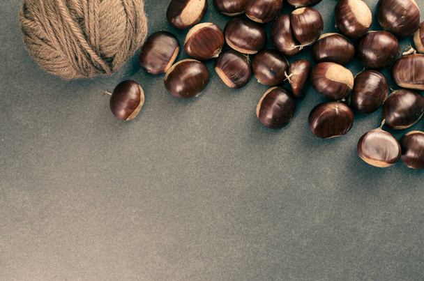 A high angle shot of hazelnuts and a walnut - Fotó, kép