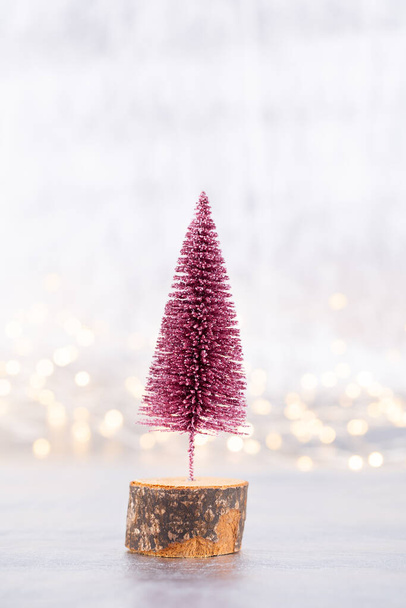 Christmas tree on silver, bokeh background. - Фото, изображение