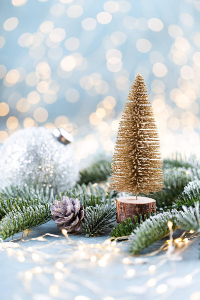 Christmas spruce with tree and blurred shiny lights. - Valokuva, kuva