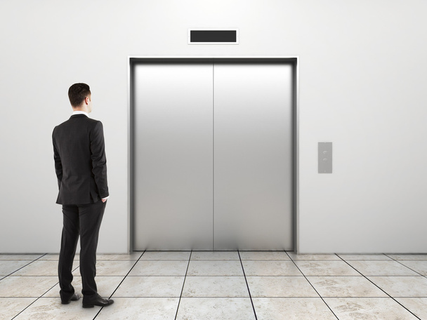 businessman and elevator - Foto, Imagem