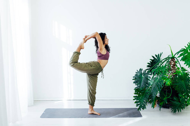 Beautiful female brunette yoga fitness sports asana body flexibility - Photo, Image