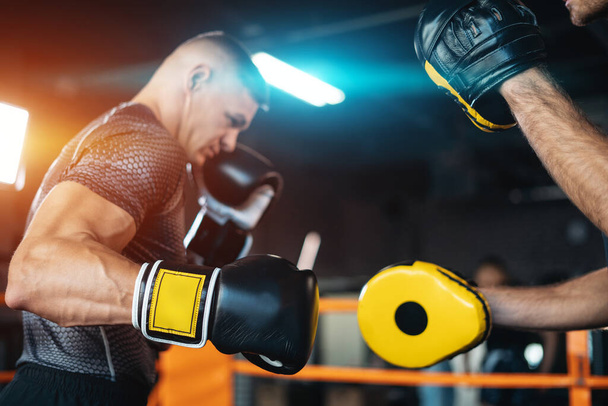 two muscle boxers sport man training and fighting on boxing ring at gym - Foto, Imagen