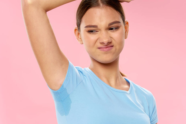 girl with sweaty armpit bad smell health problems pink  - Photo, Image