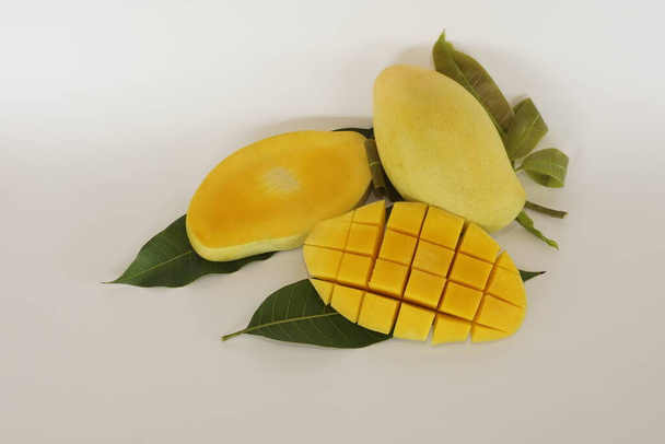 chopped mango fruits on white background - Photo, Image