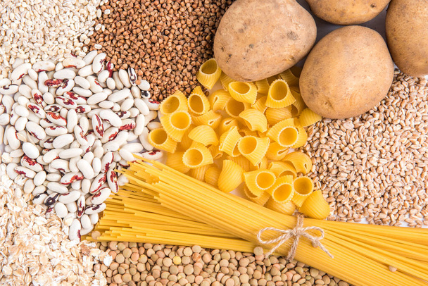Carbohydrates of , potatoes and groats. Pasta, lentil, buckwheat, wheat and bean. - Photo, Image