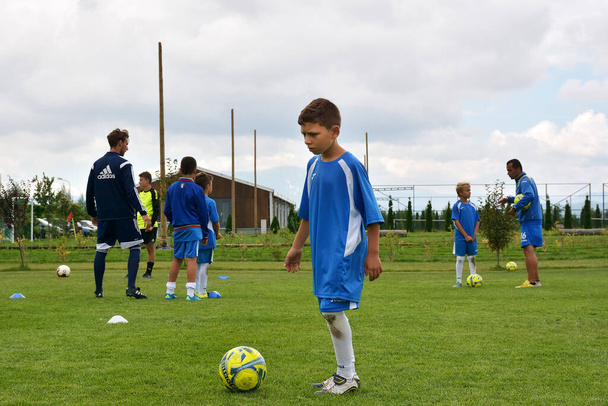 GHIMBAV, BRASOV, ROMANIA - AGUST 3: Soccer football training camp for kids, children at FOREX GHIMBAV, Romania 03 august 2016 - Photo, image