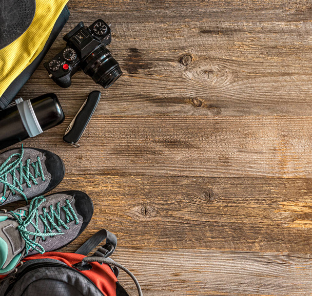 Trekking equipment on wooden background - Zdjęcie, obraz