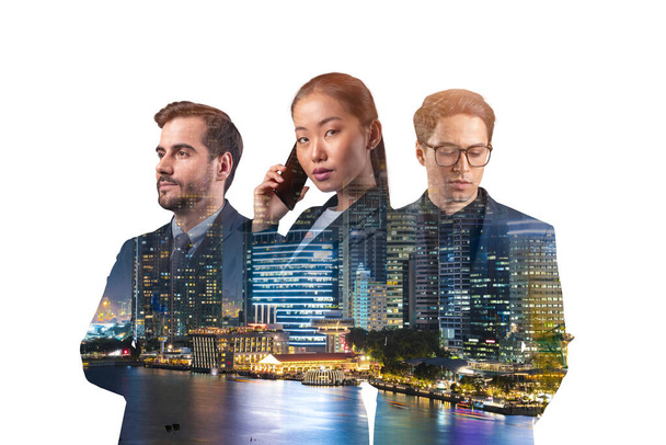Double exposure of three young, successful, business people, man and woman, standing in front of Asian city Singapore background. Concept of hard work and study. Modern life way. Night time. - Photo, Image