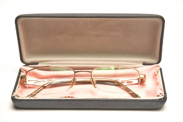 Glasses in a case on a light background. - Photo, Image