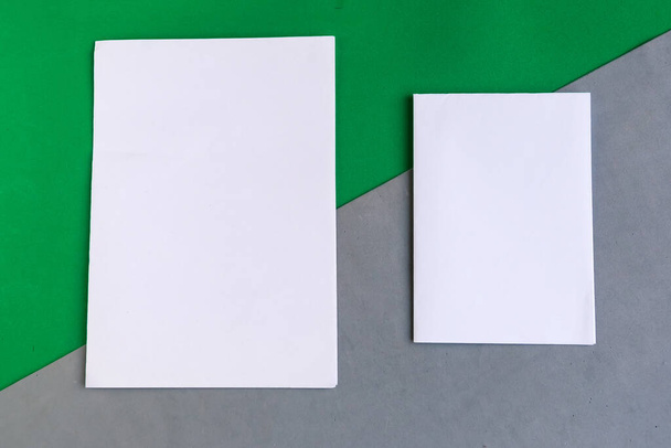 Two white mockup blanks on color geometric background, copy space for the text - Fotografie, Obrázek