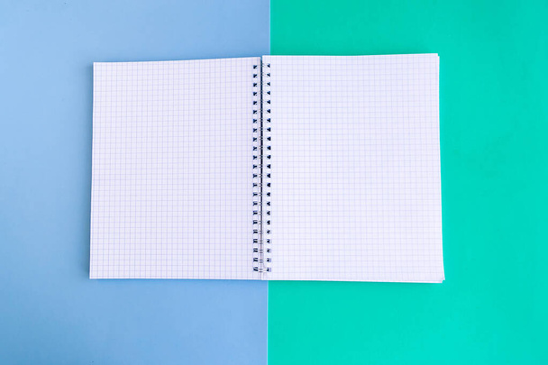 Open mockup notepad on color background, copy space for the text - Photo, Image