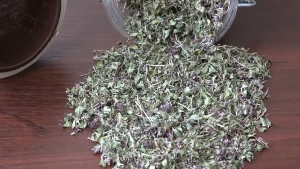 Herbal tea. Heap of dried wild thyme flowers - Footage, Video